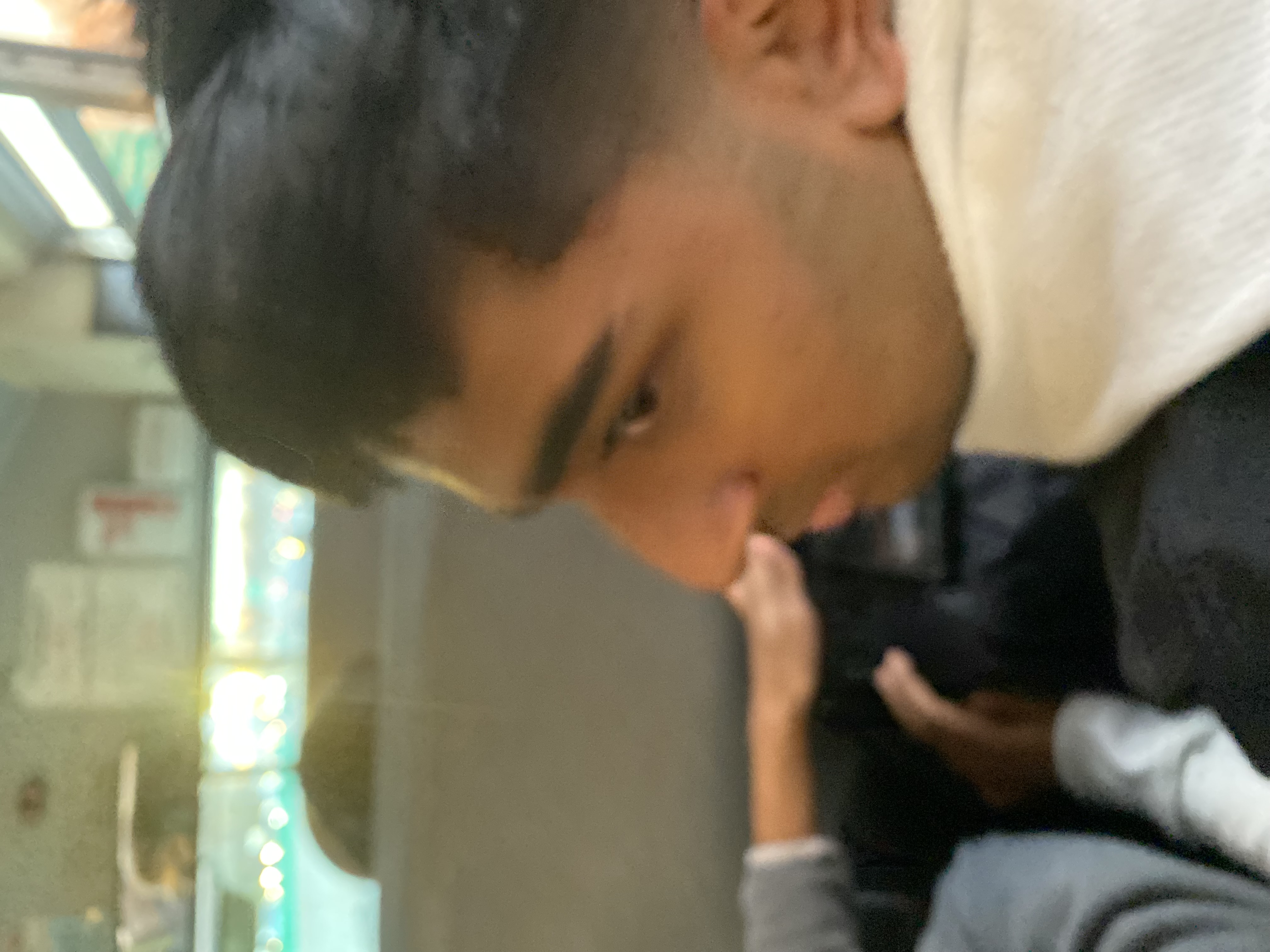 Student sitting indoors